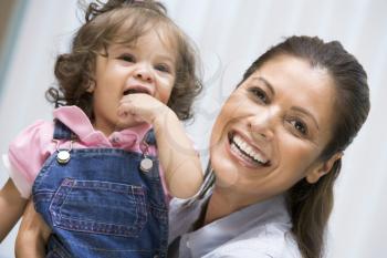 Royalty Free Photo of a Woman Holding a Girl