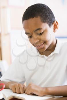 Royalty Free Photo of a Boy Reading