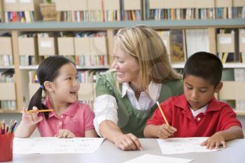 Royalty Free Photo of Two Students With a Teacher