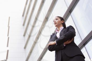 Royalty Free Photo of a Businesswoman Outside a Building