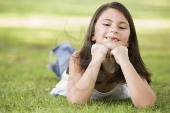 Royalty Free Photo of a Girl on the Grass