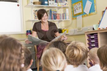 Royalty Free Photo of a Teacher Reading