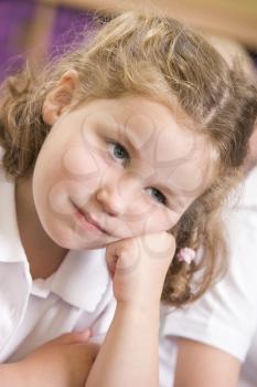 Royalty Free Photo of a Girl Looking Bored