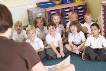 Royalty Free Photo of Students in a Classroom With the Teacher