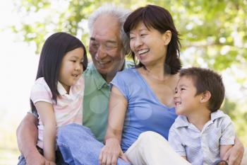 Royalty Free Photo of a Couple With Their Grandchildren