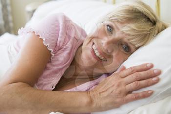 Royalty Free Photo of a Woman in Bed