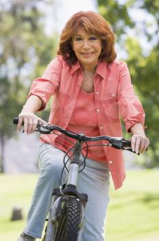 Royalty Free Photo of a Woman on a Bike