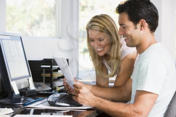 Royalty Free Photo of a Couple With a Computer