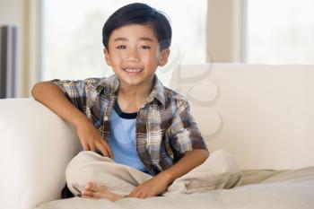 Royalty Free Photo of a Boy on a Couch
