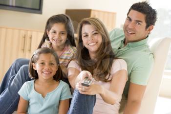 Royalty Free Photo of a Family Watching Television