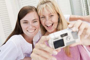 Royalty Free Photo of Women Taking a Picture