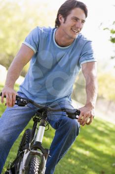 Royalty Free Photo of a Man on a Bike