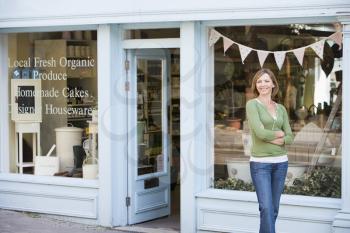 Royalty Free Photo of a Woman Outside an Organic Food Store