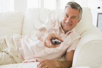 Royalty Free Photo of a Man With a Remote