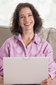 Royalty Free Photo of a Woman With a Laptop