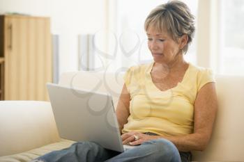 Royalty Free Photo of a Woman With a Laptop