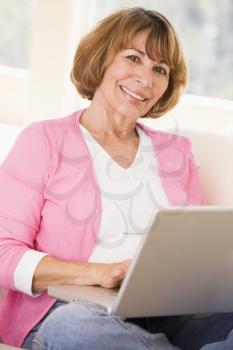 Royalty Free Photo of a Woman With a Laptop