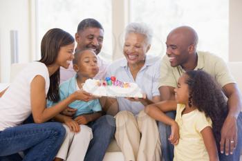 Royalty Free Photo of a Family With Birthday Cake