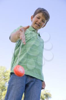 Royalty Free Photo of a Boy With a Yo-Yo