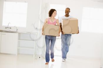 Royalty Free Photo of a Couple Moving In