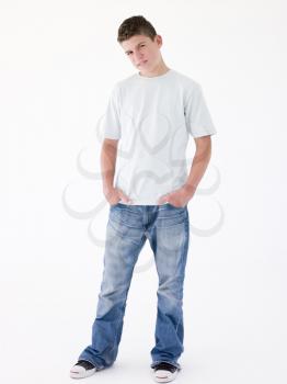 Royalty Free Photo of a Boy With His Hands in His Pockets