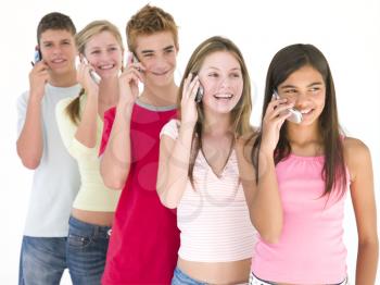 Royalty Free Photo of Five Friends Talking on Cellphones