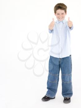 Royalty Free Photo of a Boy Giving Thumbs Up