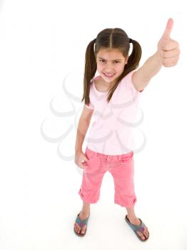 Royalty Free Photo of a Girl Giving Thumbs Up