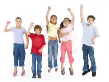 Five friends jumping and smiling