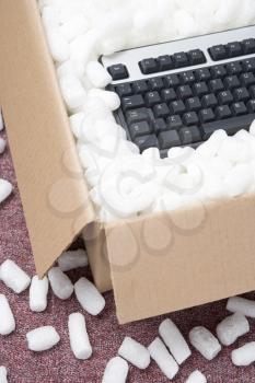 Royalty Free Photo of a Box With a Keyboard