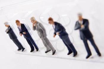 Royalty Free Photo of a Row of Businessman Figurines