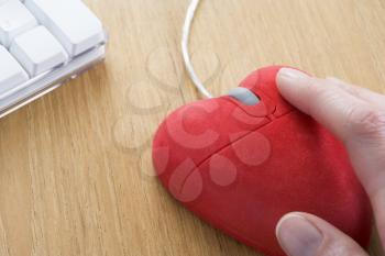 Royalty Free Photo of a Heart Shaped Computer Mouse
