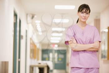 Royalty Free Photo of a Nurse in a Corridor