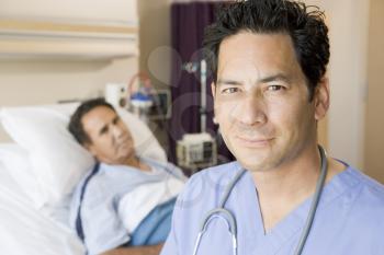 Royalty Free Photo of a Doctor in a Patient's Room