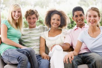 Royalty Free Photo of a Group of Teens on a Couch