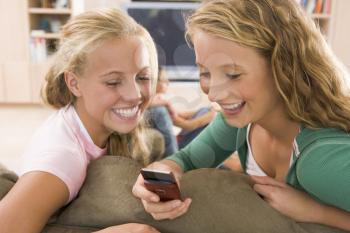 Royalty Free Photo of Girls With a Cellphone