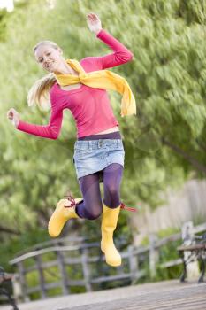 Royalty Free Photo of an Energetic Girl Outside