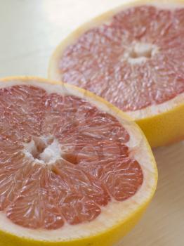Royalty Free Photo of a Halved Pink Grapefruit