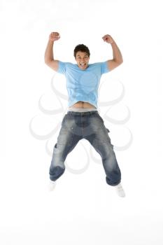 Teenage Boy Jumping In The Air