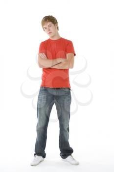 Royalty Free Photo of a Boy With His Arms Crossed