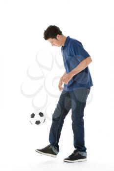 Royalty Free Photo of a Boy With a Soccer Ball