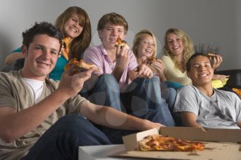 Royalty Free Photo of Teens Having Pizza