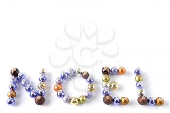 Royalty Free Photo of Ornaments Spelling Noel