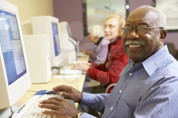 Royalty Free Photo of Seniors at Computers