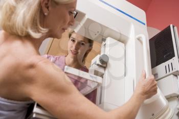 Royalty Free Photo of a Woman Having a Mammogram