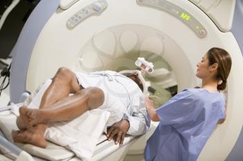 Royalty Free Photo of a Person Having a CAT Scan