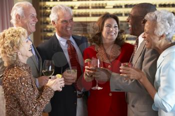 Royalty Free Photo of Friends Socializing at a Bar