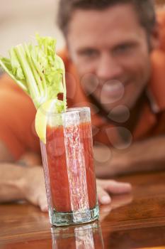 Royalty Free Photo of a Man With a Bloody Mary