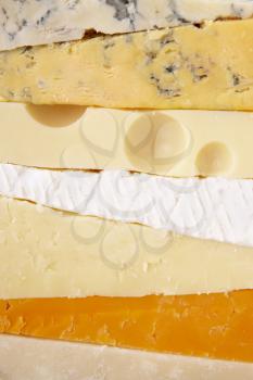 Royalty Free Photo of a Stack of Cheeses