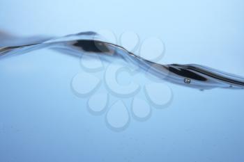Royalty Free Photo of Water Rippling Against Glass